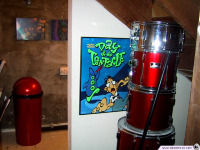 The door to the Double Fine bathroom sports a Day of the Tentacle poster... and snare drums?