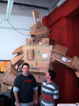 Dave quakes in fear of the giant Double Fine cardboard box robot, simply named 